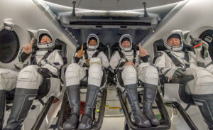 NASA astronauts Shannon Walker, left, Victor Glover, Mike Hopkins, and Japan Aerospace Exploration Agency (JAXA) astronaut Soichi Noguchi, right.  